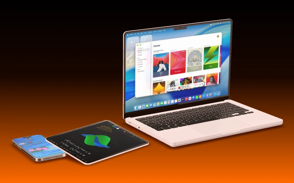 A MacBook Pro 14" on the desk with an iPad Pro 13" and an iPhone 16 Pro Max lying in front of it.
